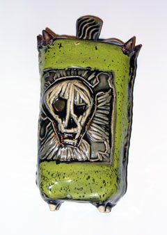 Green skull flask